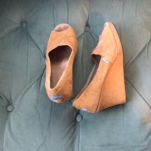 Tom’s corduroy open toed platforms.